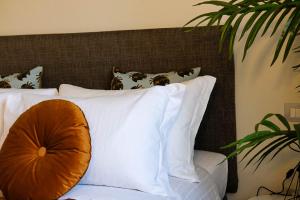 Postel nebo postele na pokoji v ubytování Verona Suites and Rooms