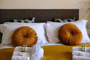 Postel nebo postele na pokoji v ubytování Verona Suites and Rooms