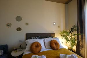 Postel nebo postele na pokoji v ubytování Verona Suites and Rooms