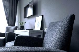 TV a/nebo společenská místnost v ubytování PARK HOTEL VILNIUS