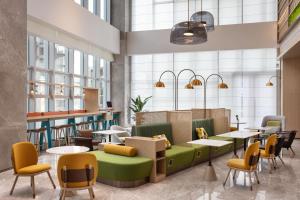 Area soggiorno di Home2 Suites by Hilton Chongqing Yubei