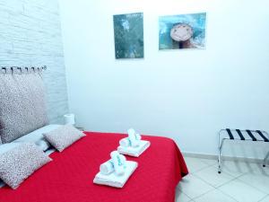Postel nebo postele na pokoji v ubytování O'Paisi Casa Vacanze