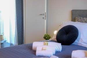 Postel nebo postele na pokoji v ubytování Verona Suites and Rooms