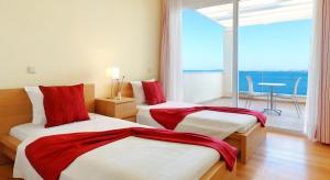 Posteľ alebo postele v izbe v ubytovaní Corfu Luxury Villas