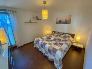 Ein Bett oder Betten in einem Zimmer der Unterkunft Haus Putbus in Altefähr - WG 3 mit Panoramablick