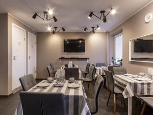 TV a/nebo společenská místnost v ubytování PARK HOTEL VILNIUS