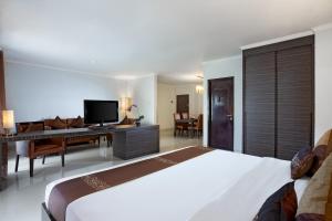 Voodi või voodid majutusasutuse Palace Hotel toas