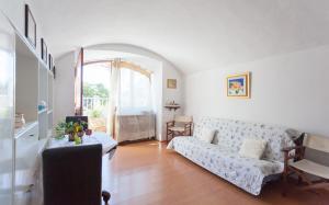 Гостиная зона в Apartment Capitano Blue
