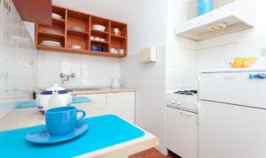 Кухня или мини-кухня в Apartment Capitano Blue
 +6 фотографий