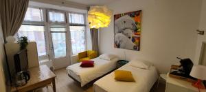 TV a/nebo společenská místnost v ubytování Chambre de charme à Saulieu