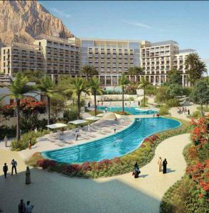 uma representação de um resort com uma piscina em Address Beach Resort Fujairah Apartment 2 Bed Rooms and Small Bed Room - Ground Floor 3011 em Al Aqah