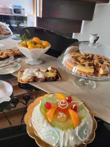 a table with several plates of food on it at La Vucciria di Guttuso in Palermo