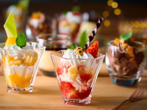 a group of four cups filled with fruit and whipped cream at TAOYA Nikko Kirifuri in Nikko