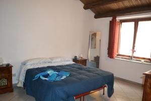 Säng eller sängar i ett rum på Case al Castello