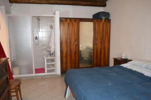 Säng eller sängar i ett rum på Case al Castello