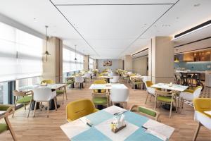 Restaurace v ubytování Home2 Suites By Hilton Wuhan Xudong
