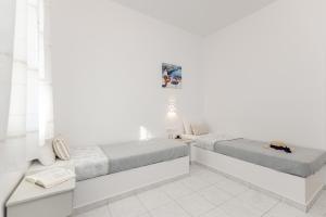 Posezení v ubytování Zanneta Apartments & Suites + 37 fotografií