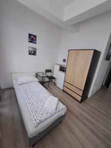 Postel nebo postele na pokoji v ubytování Figaro Apartaments