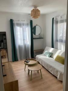 Postel nebo postele na pokoji v ubytování La Kaz Hibiscus, jacuzzi privé + 12 fotografií