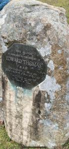 a plaque on a rock in the grass at The Old Dairy Steep,Petersfield in Collyers Estate in the South Downs National park in Petersfield