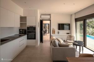 A kitchen or kitchenette at Villa Hermes