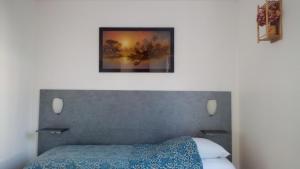 Posteľ alebo postele v izbe v ubytovaní VUE EXCEPTIONNELLE SUR LE LAC