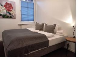 Postel nebo postele na pokoji v ubytování Hotel Rosenhof Braunlage