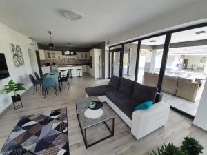 Posedenie v ubytovaní Solymos Apartmanház