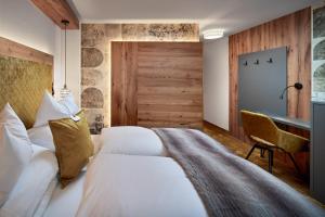 Letto o letti in una camera di Hotel Edenlehen