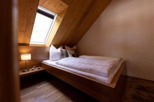 Postel nebo postele na pokoji v ubytování Landhofmühle