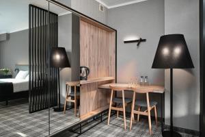 Postel nebo postele na pokoji v ubytování Hotel Halo Szczyrk