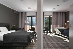 Postel nebo postele na pokoji v ubytování Hotel Halo Szczyrk