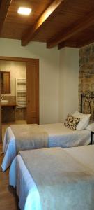Postel nebo postele na pokoji v ubytování Casa Lixa Hotel Rural Albergue