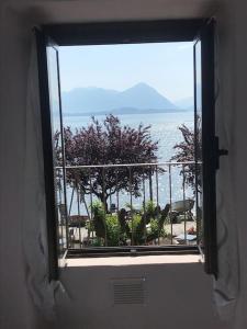 a view of the ocean from a window at Casa Aurora in Baveno