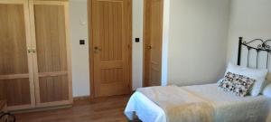 Postel nebo postele na pokoji v ubytování Casa Lixa Hotel Rural Albergue