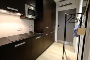 Köök või kööginurk majutusasutuses Qstay Good Living Apartments
