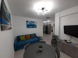 A television and/or entertainment centre at SYKA Thassos - Villa 4 Rooms SKALA RACHONIOU