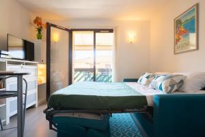 Posteľ alebo postele v izbe v ubytovaní Studio pour 2 à 4 personnes sous les Pins climatisé