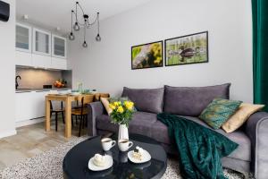 Posezení v ubytování Apartamenty Olimpijska nad jeziorem Ukiel