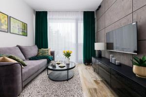 Posezení v ubytování Apartamenty Olimpijska nad jeziorem Ukiel