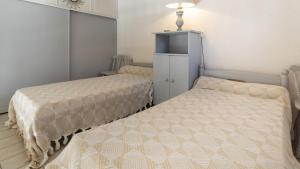 Posteľ alebo postele v izbe v ubytovaní Les Ondines 2- 33- Maison mezzanine- 6 pers