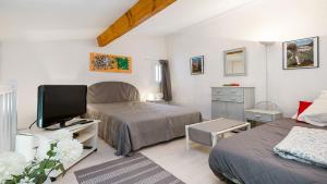 Posteľ alebo postele v izbe v ubytovaní Perles du Soleil- 12- Maison moderne- 5 pers