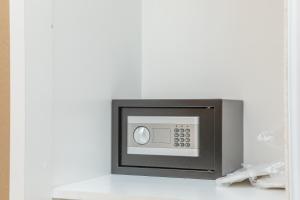 a microwave oven sitting on top of a counter at MY HOTEL in Borjomi