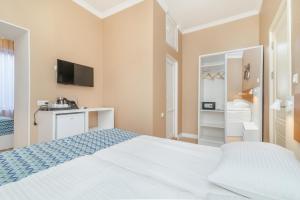 Voodi või voodid majutusasutuse MY HOTEL toas