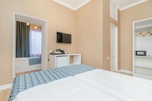 Voodi või voodid majutusasutuse MY HOTEL toas