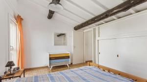 Łóżko lub łóżka w pokoju w obiekcie Sun Village- 39- Maison duplex- 6 pers