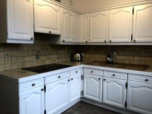 Kuchyňa alebo kuchynka v ubytovaní Apartment Bourg St Maurice
