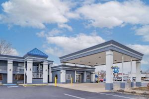 a gas station in a parking lot at Days Inn by Wyndham Fredericksburg North in Fredericksburg