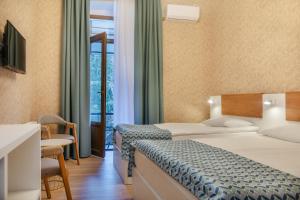 Voodi või voodid majutusasutuse MY HOTEL toas