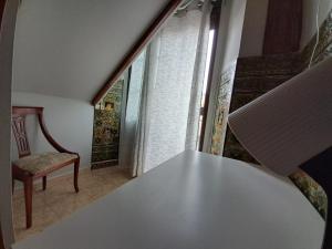 Ein Sitzbereich in der Unterkunft Pensión Riosol